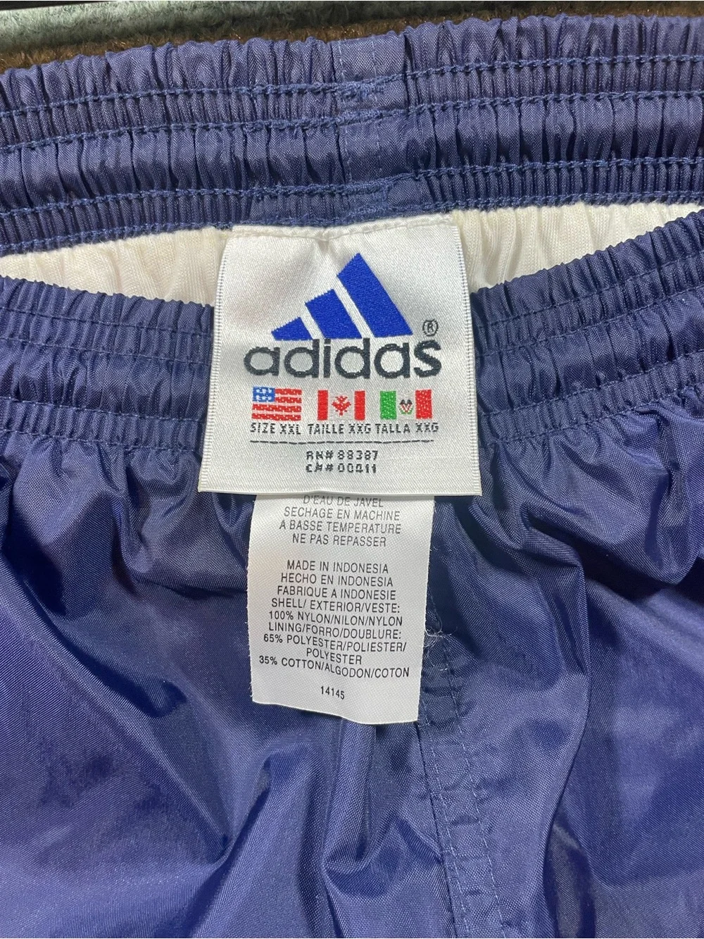Vintage Men's adidas Y2K Navy Track Pants with Royal Blue Side Stripes
